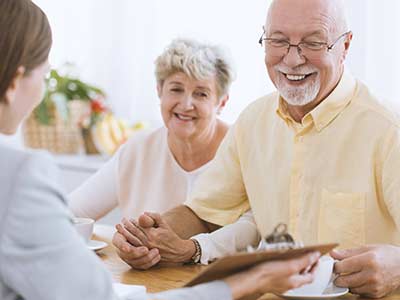 Life Insurance — Senior Couple Talking to Agent in Milwaukee, WI