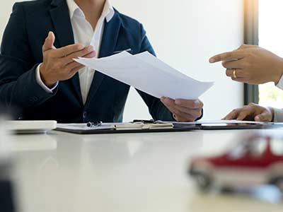 Commercial Insurance — Businessman Checking Insurance Document in Milwaukee, WI