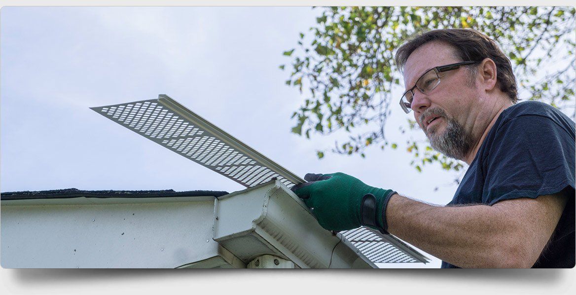 all oz roof plumbing installing filter in roof gutter
