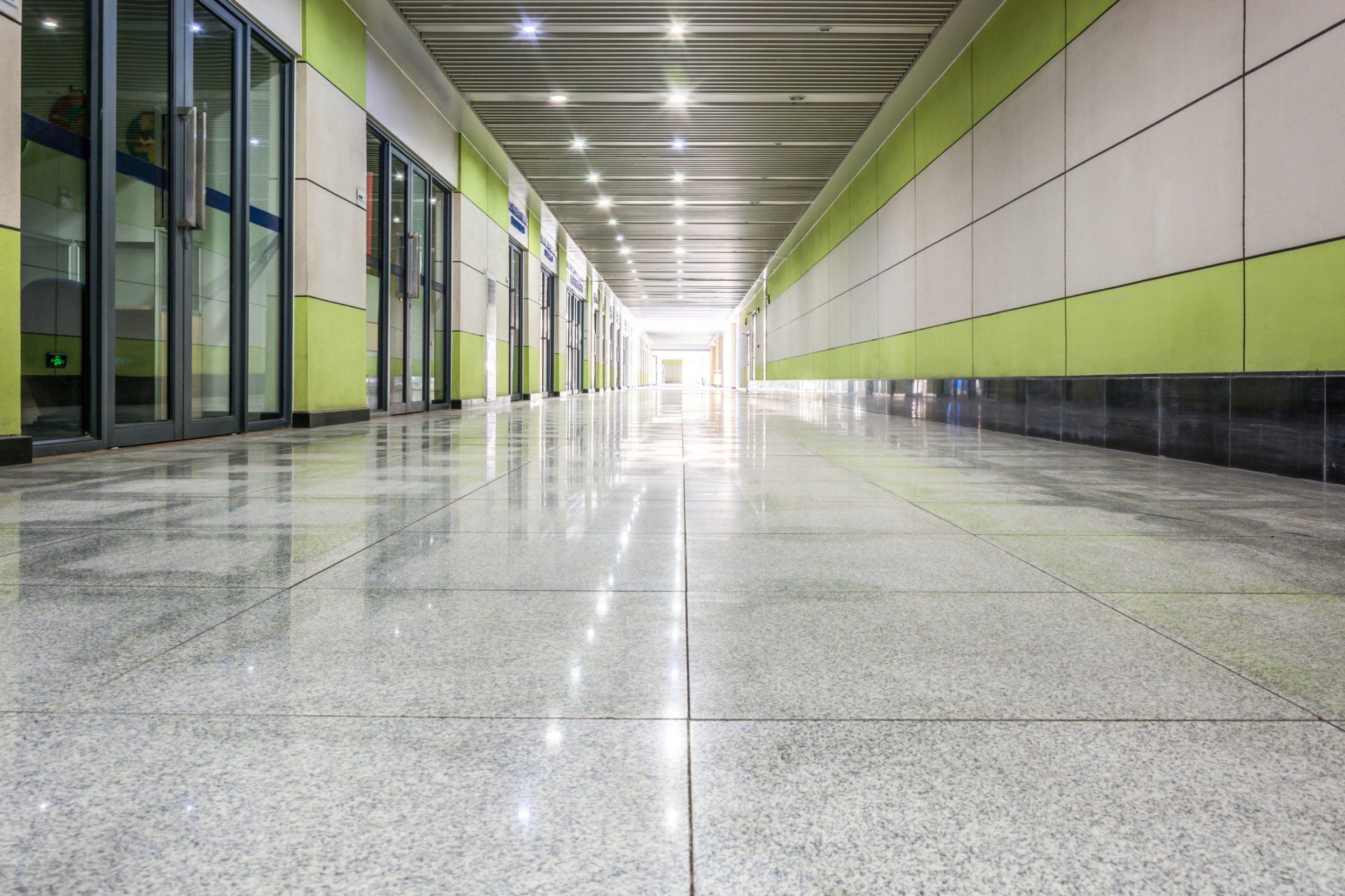 We can make your office look like this! Call us today for a professional cleaning Freshly Clean Corridor of business building
