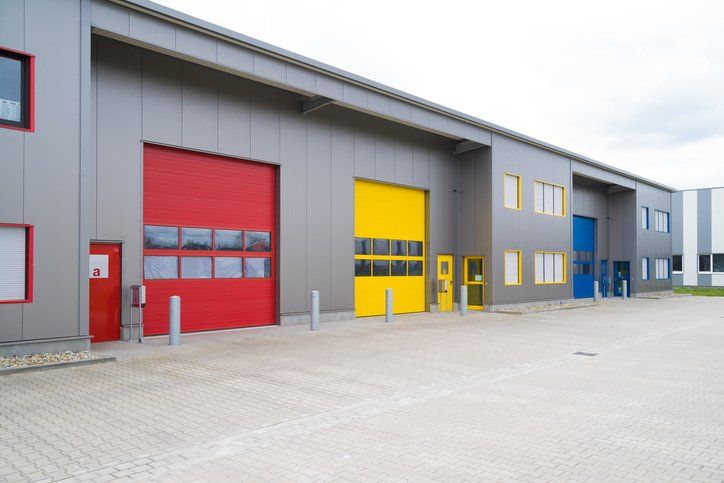 Commercial Garage — Commercial Garage Door Brochures in Merrill, WI Commercial Garage — Commercial Garage Door Brochures in Merrill, WI