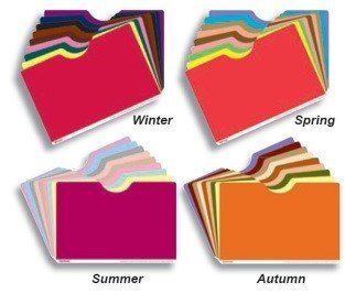 Four folders of different colors with the words winter spring summer and autumn on them