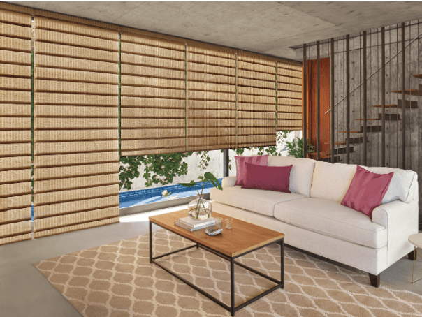 Choosing between Roman shades or drapes near Lakewood Ranch, Florida, for bedrooms, living rooms, and kitchens