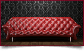 White antique chair on a wooden floor