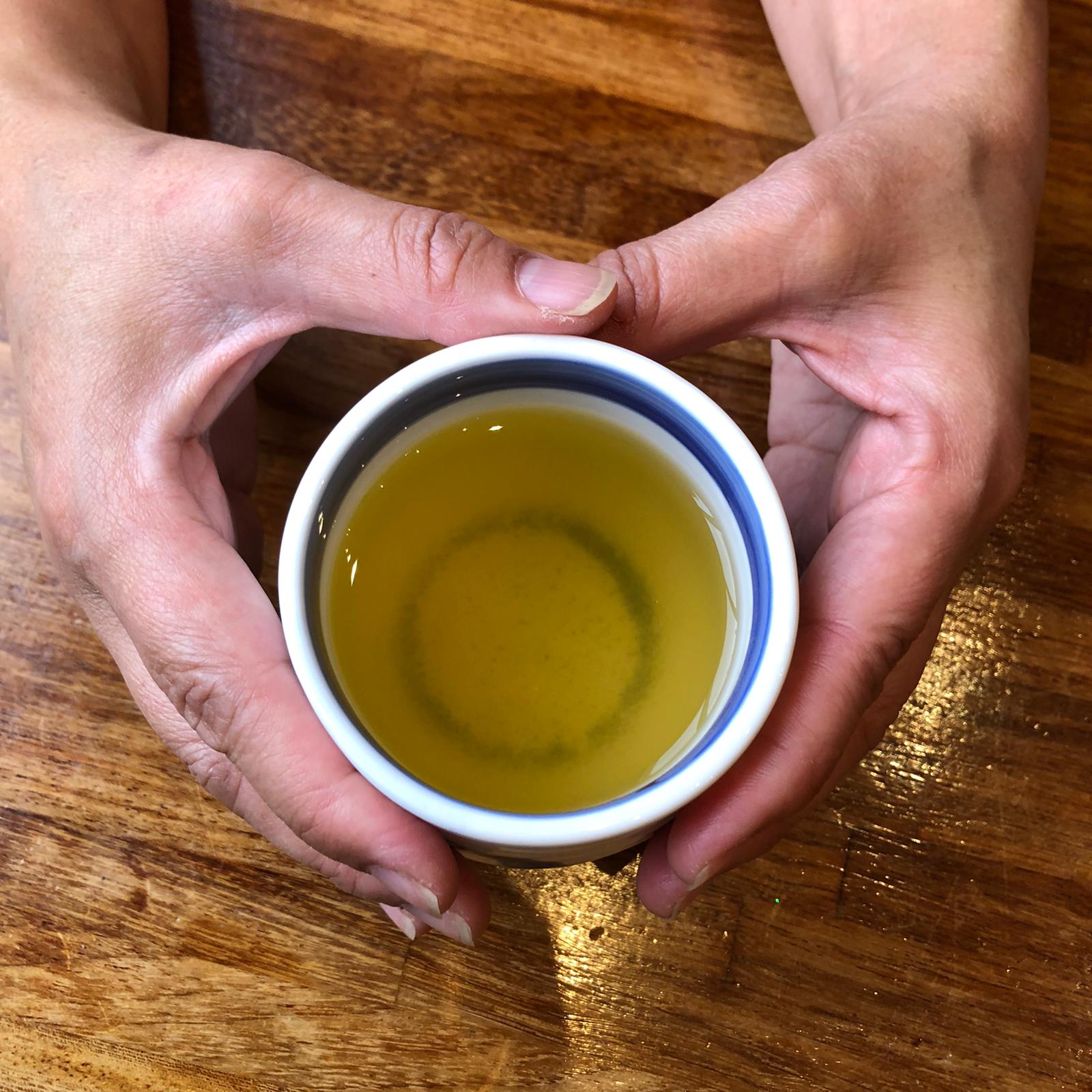Person holding a drink