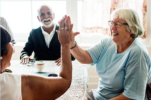 In Home Care Assistance — Nurse and Elderly Man in Palm Desert, CA