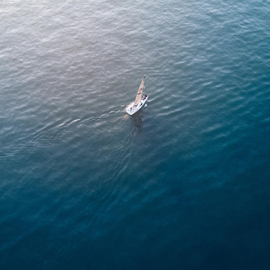 charter yacht sailing in calm seas