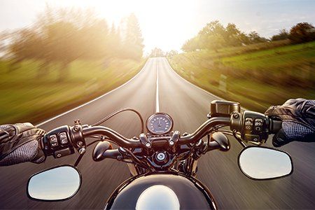 Man Riding on a Motorcycle — Boynton Beach, FL — Insurance World Man Riding on a Motorcycle — Boynton Beach, FL — Insurance World