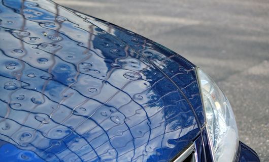 Hail Damage — Car with Dents in Colorado Springs, CO Hail Damage — Car with Dents in Colorado Springs, CO