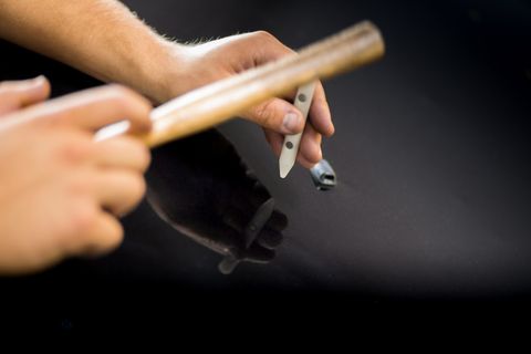 Dent Repair — Technician Polishing Car in Colorado Springs, CO Dent Repair — Technician Polishing Car in Colorado Springs, CO