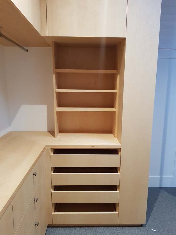 new light wood shelves and drawers