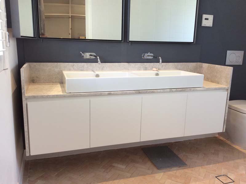 new bathroom sinks and cabinetry