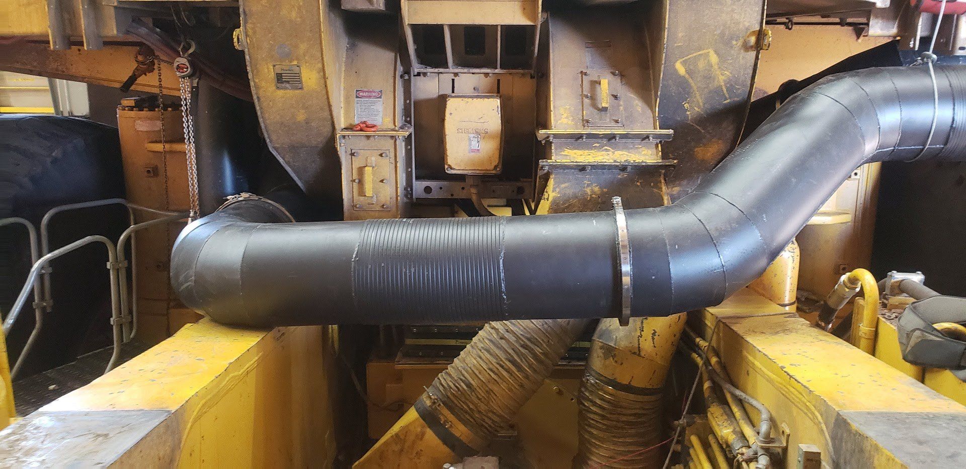 Dual wall exhaust pipe installed