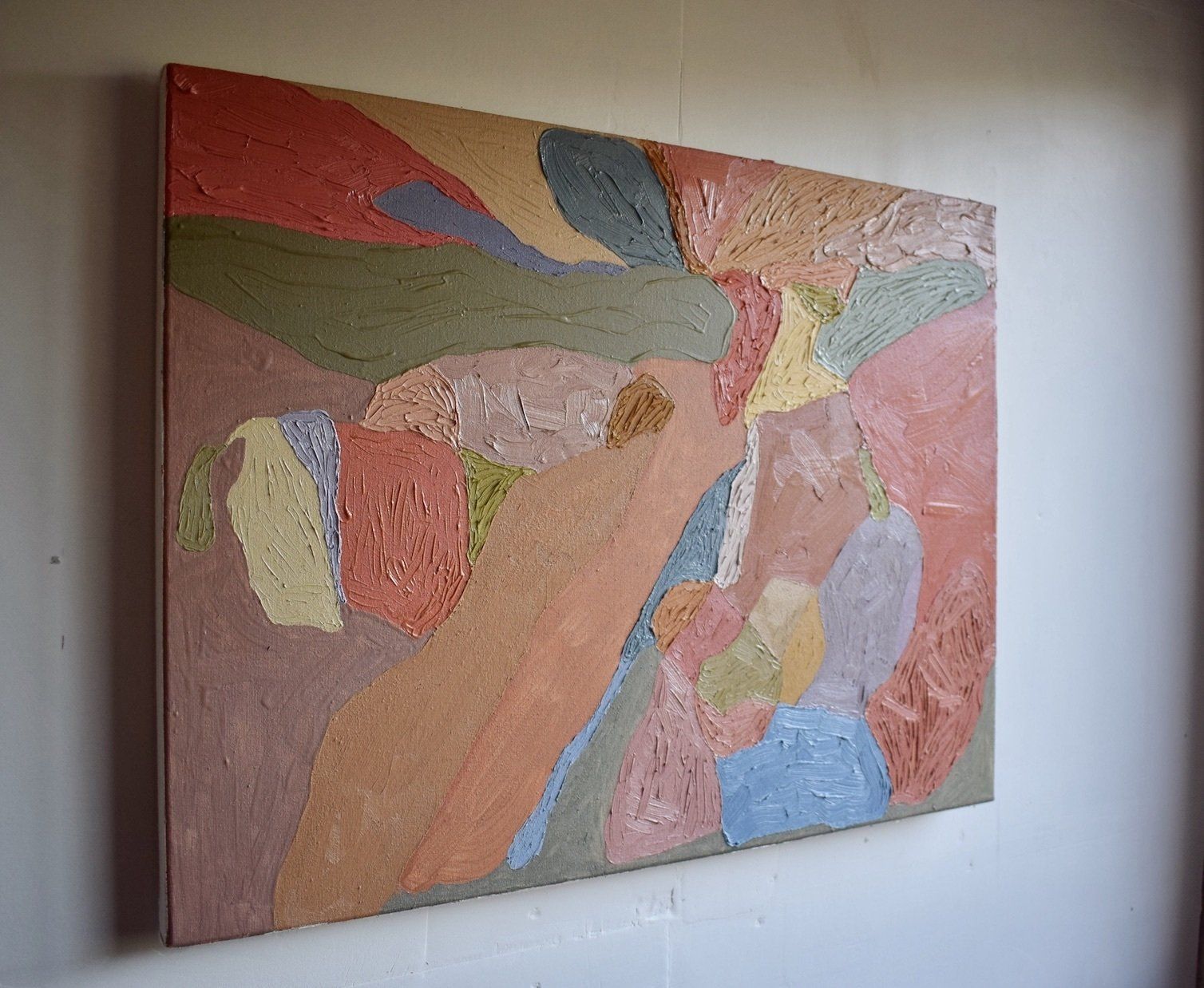 colourful abstract paintings on gallery wall by artist siobhan mclaughlin