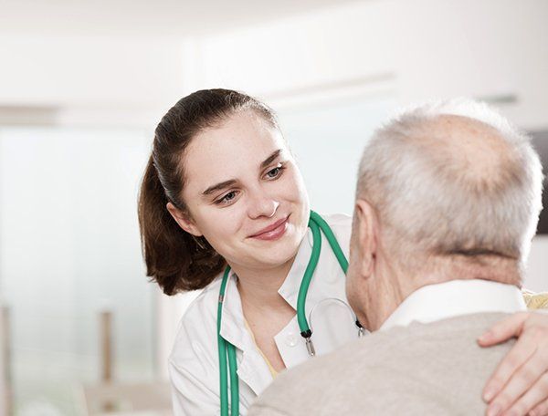 Doctor and Senior Man — Private Care in Decatur, IL Doctor and Senior Man — Private Care in Decatur, IL