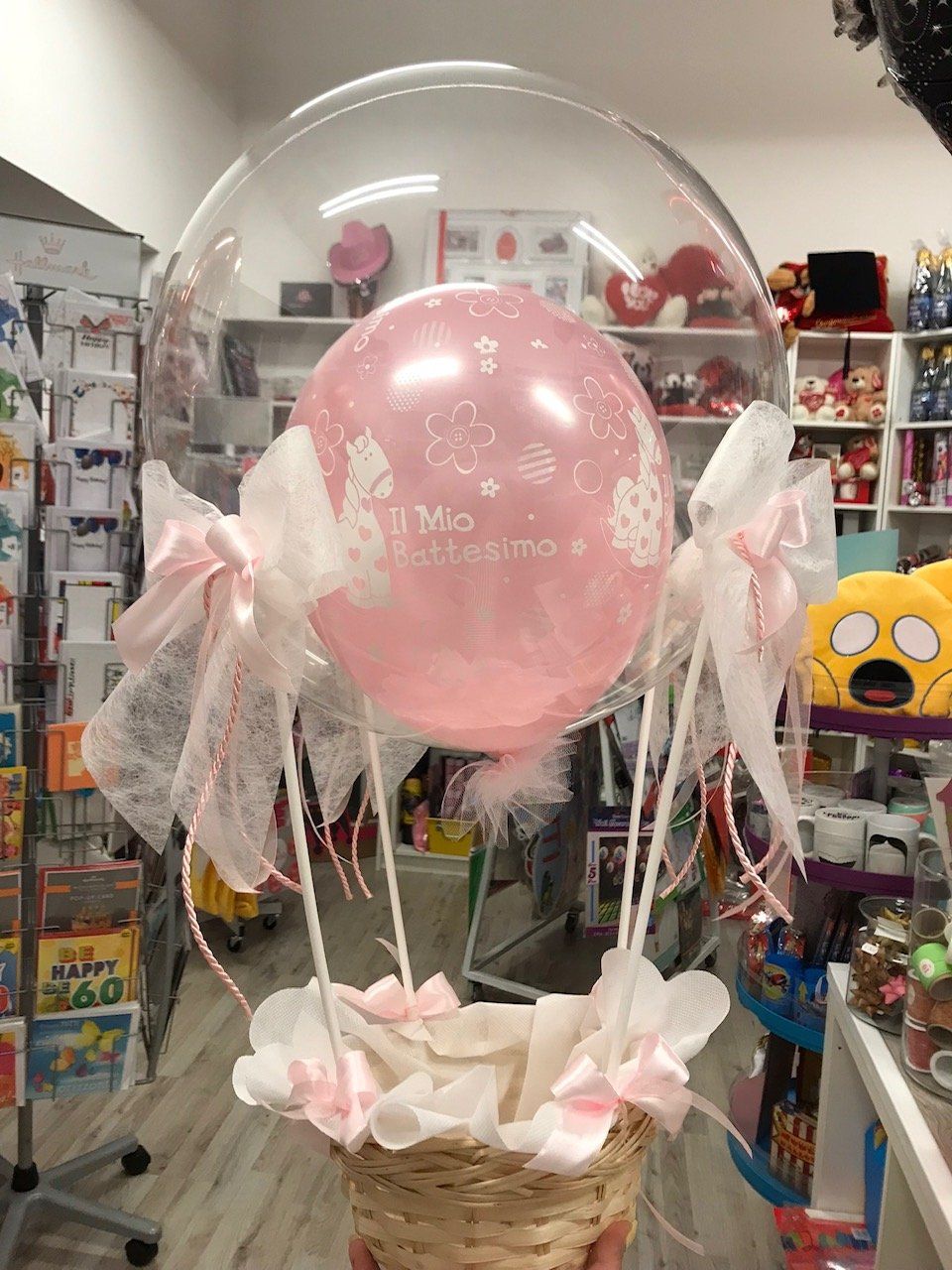 decorazione con palloncini rosa per battesimo