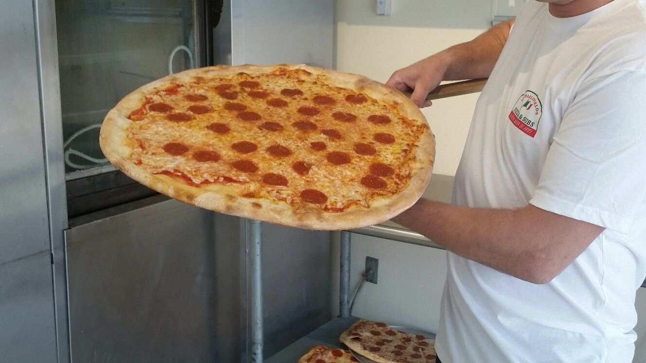 freshly cooked cheese and pepperoni pizza