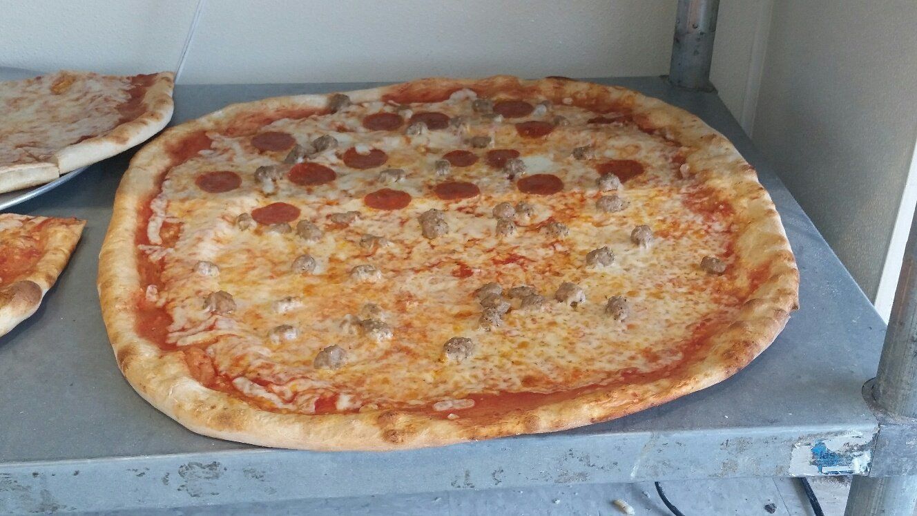 large half pepperoni and meatball New York style pizza in Greenville, NC
