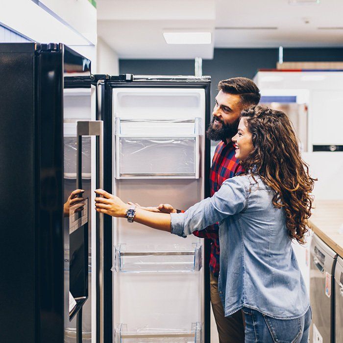 Couple Looking for a A Refrigerator — Timberville, VA — Matt’s Appliance Service Inc