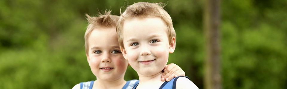young kids smiling for the picture