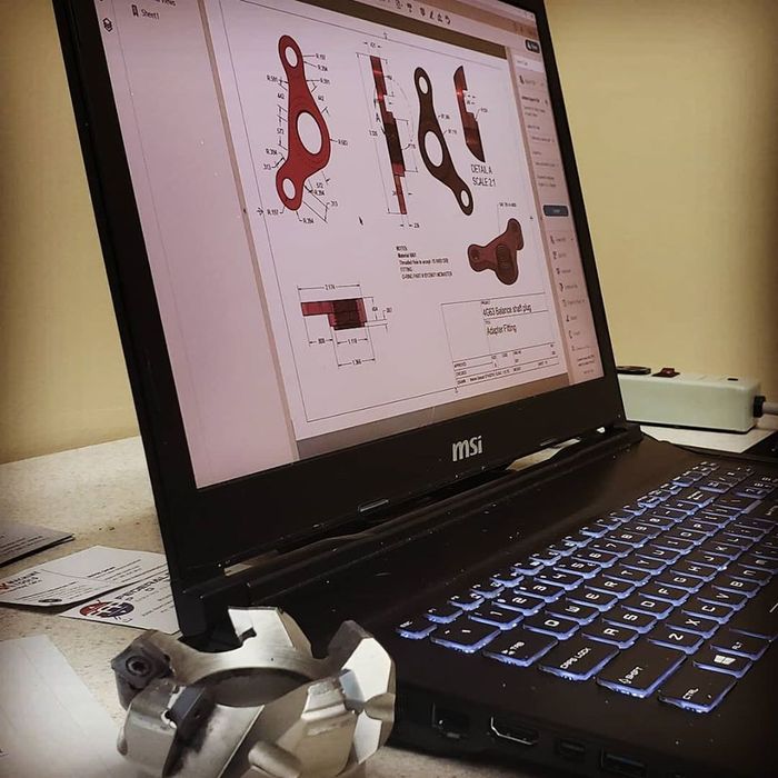 A msi laptop is open on a table