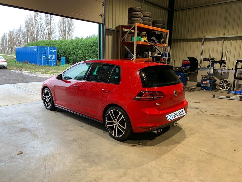 red car in garage