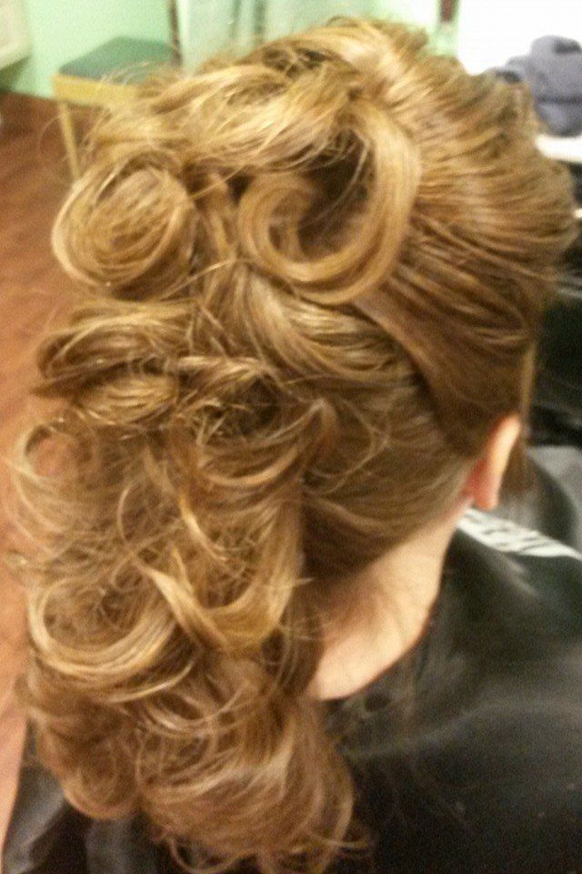 A close up of a woman's hair in a ponytail.