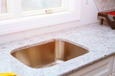 Installing Counter Top — Oroville, CA — Custom Tile & Granite Installing Counter Top — Oroville, CA — Custom Tile & Granite
