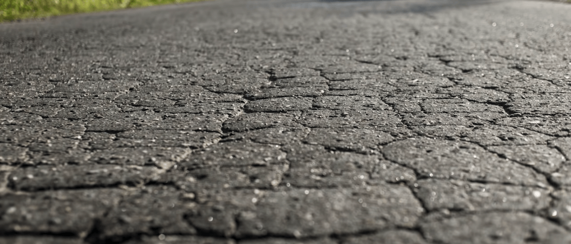 An image of cracked asphalt.