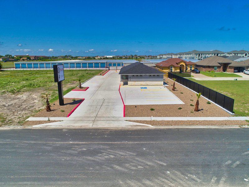 An Aerial View Of A House With A Driveway Leading To It - Corpus Christi, TX - Lock & Key Storage