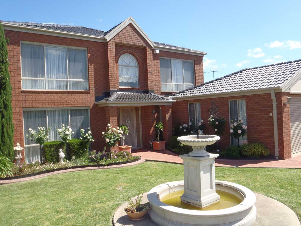 house with fountain
