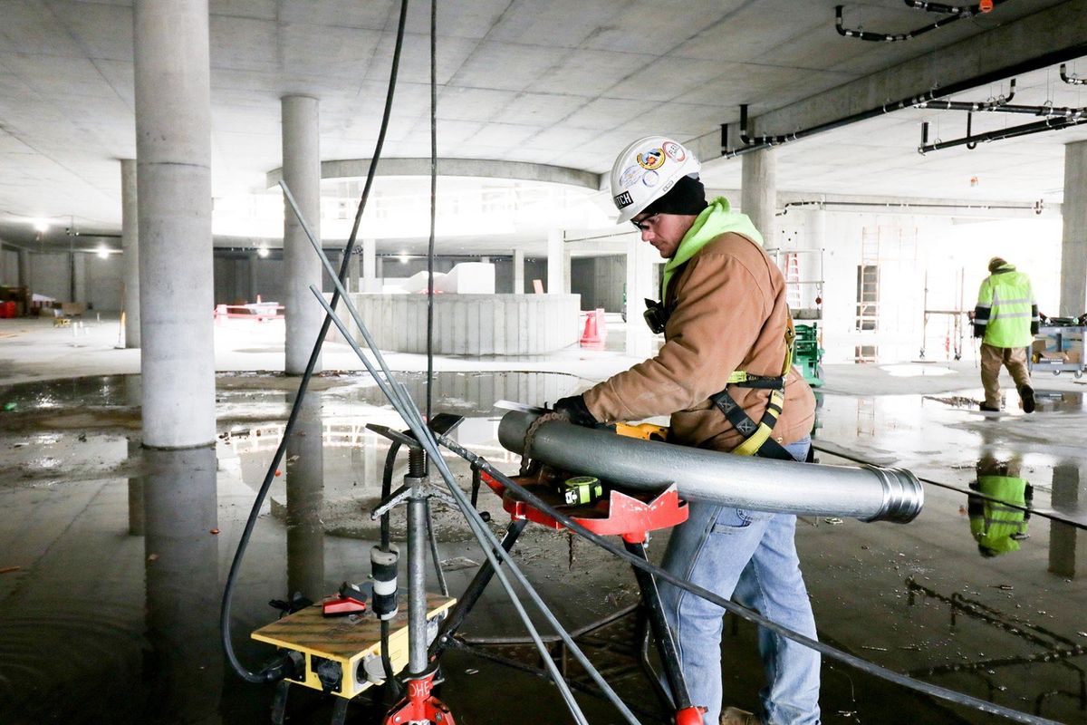 Journeyman Apprentice working at jobsite