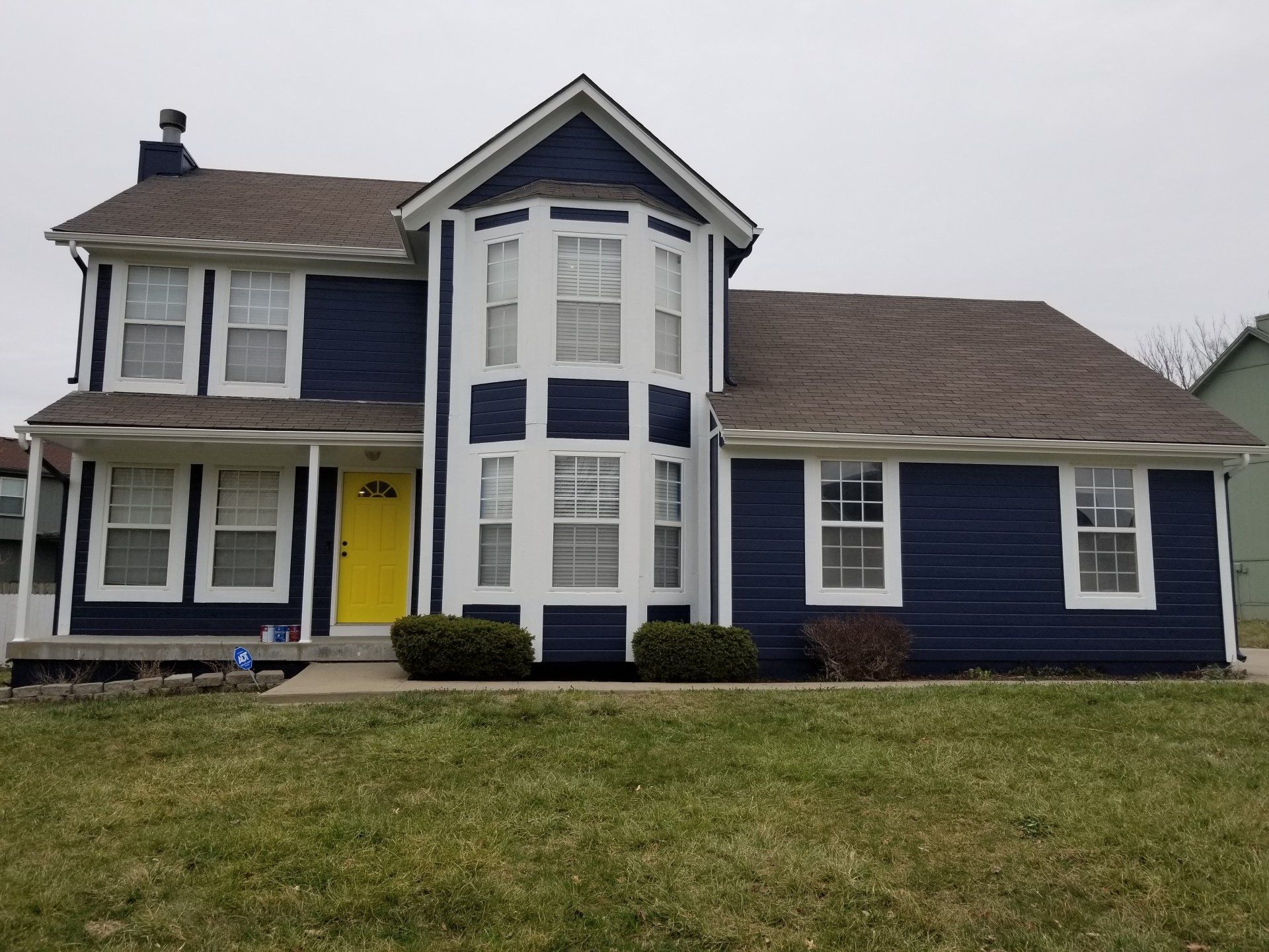 Home Pros Painting exterior house painted after Merriam