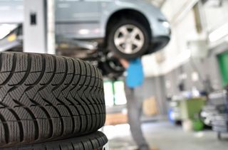 New Car Tire in Car Repair Shop — Bedford, PA — Hickey's Automotive & Towing New Car Tire in Car Repair Shop — Bedford, PA — Hickey's Automotive & Towing
