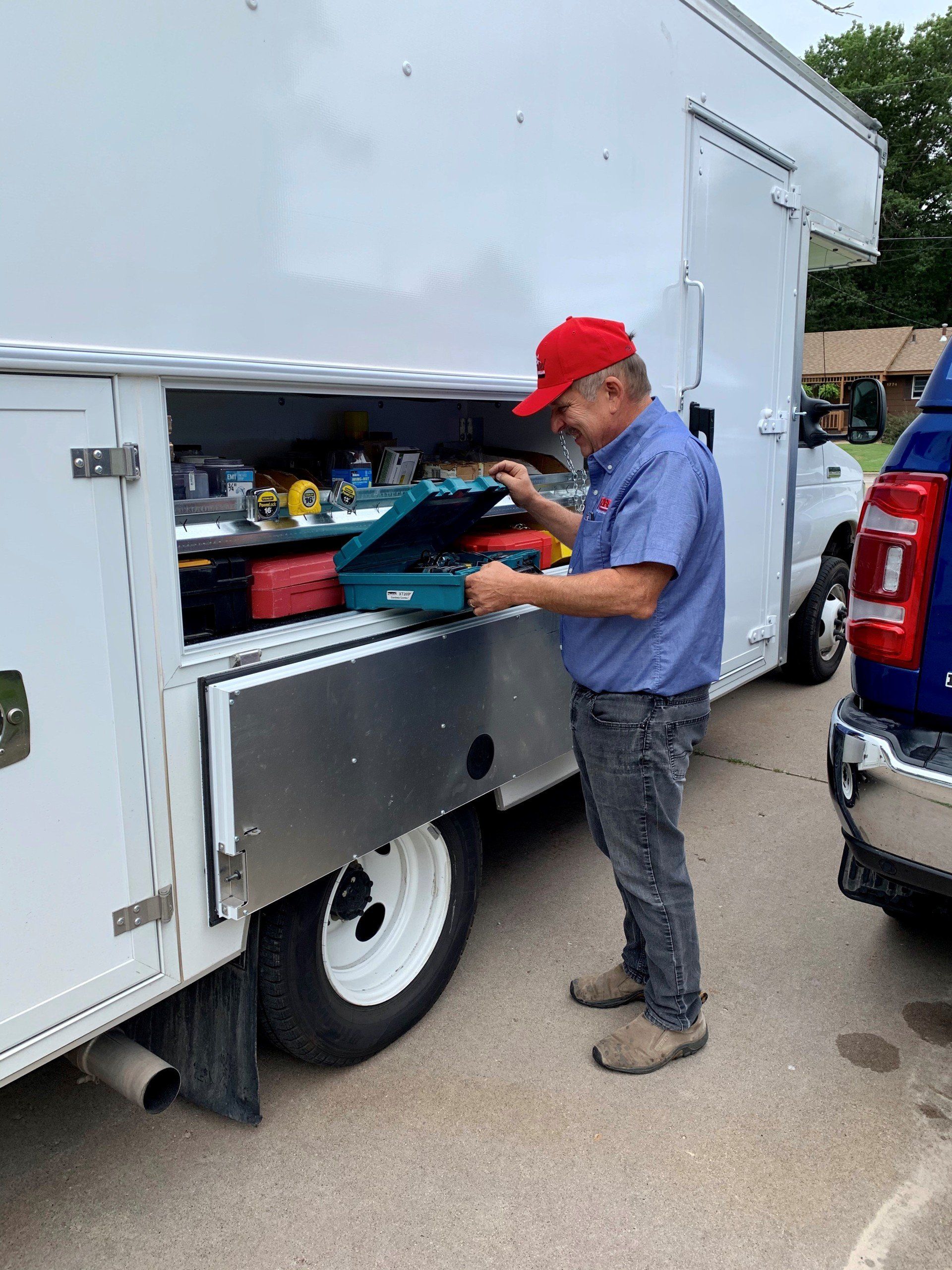Reilbel Red Car — White Bear Lake, MN — Reibel Heating & Air Conditioning Reilbel Red Car — White Bear Lake, MN — Reibel Heating & Air Conditioning