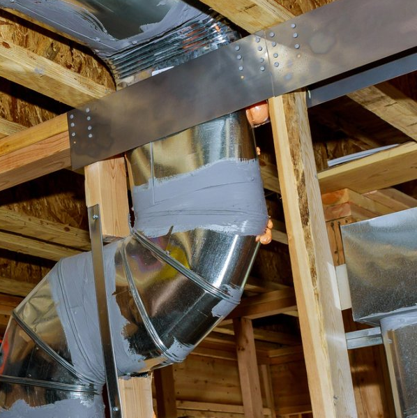 Male Hands Setting Up Ventilation System Indoors — White Bear Lake, MN — Reibel Heating & Air Conditioning Male Hands Setting Up Ventilation System Indoors — White Bear Lake, MN — Reibel Heating & Air Conditioning