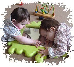 2 babies playing