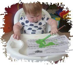 Baby painting with brush