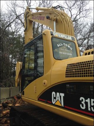 Septic Pumping — Yellow Crane Excavating in Marshfield, MA Septic Pumping — Yellow Crane Excavating in Marshfield, MA