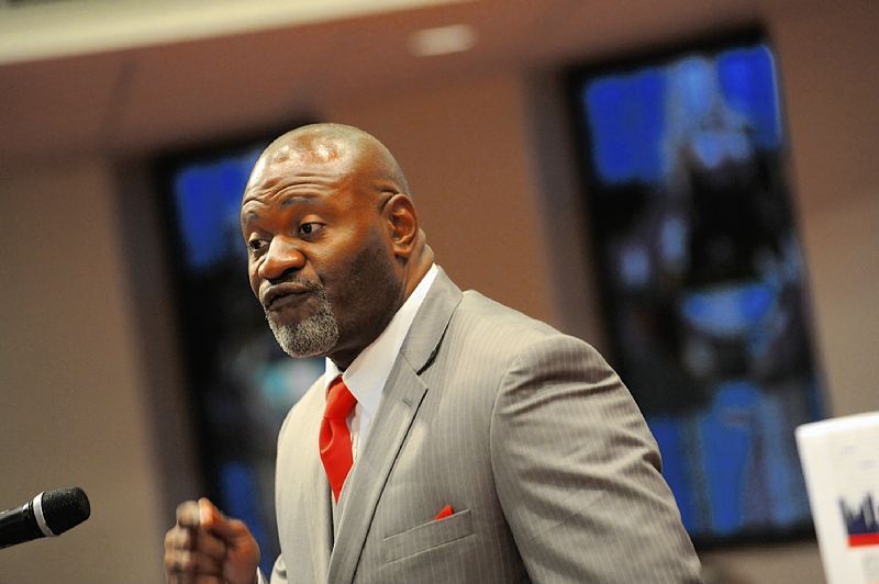 executive man in suit speak microphone