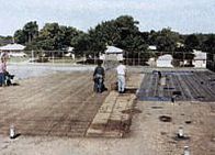 Contractor Stripping Old Roof - Hot Tar Roofing in Swansboro, North Carolina Contractor Stripping Old Roof - Hot Tar Roofing in Swansboro, North Carolina