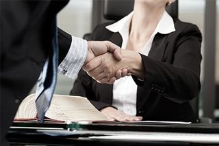 woman shaking hands