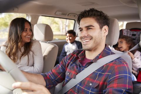 Insurance Agency — Man Driving His Car With His Family in Fort Pierce, FL