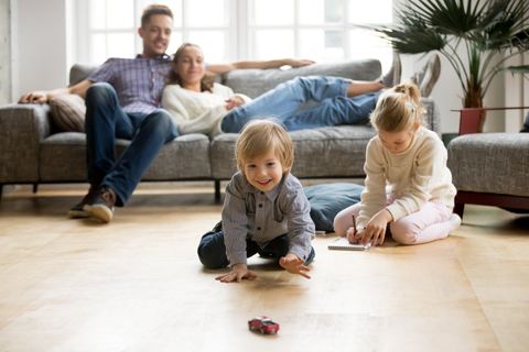 Insurance — Happy Family In Their New Home in Fort Pierce, FL