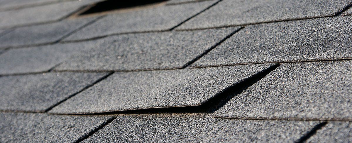 Damaged roof shingles