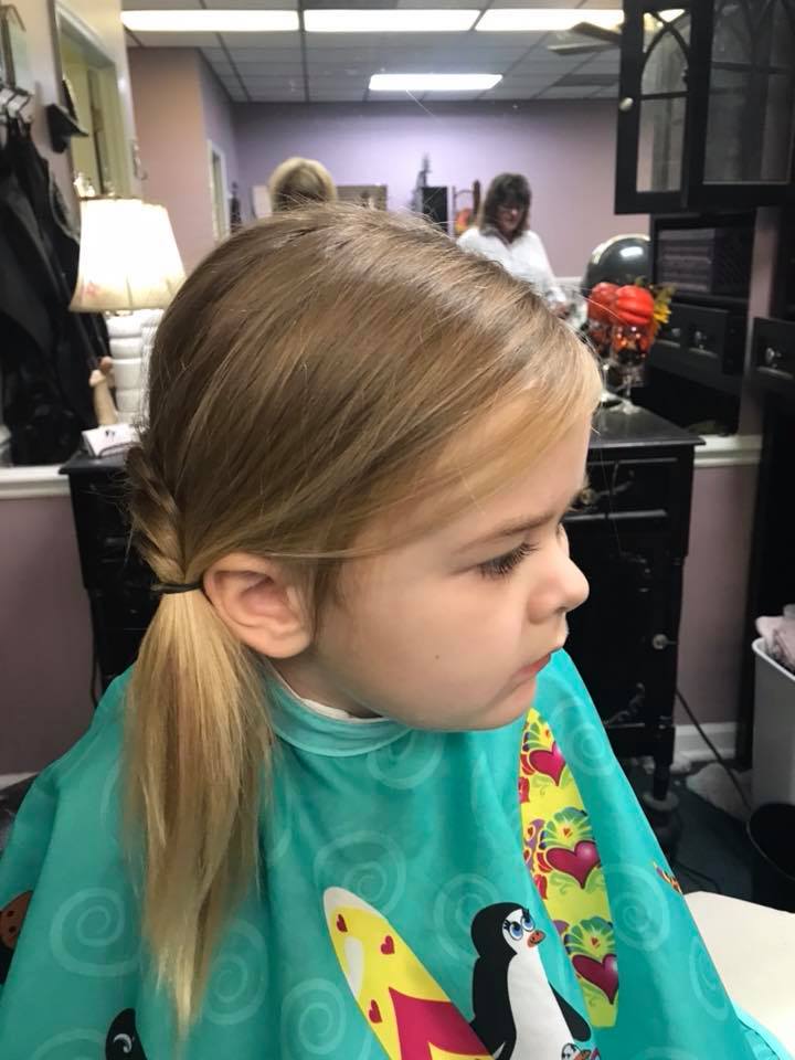 little girl with fishtail braid