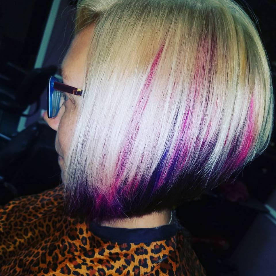 Kayla after photo, side view - stacked bob with rainbow lowlights