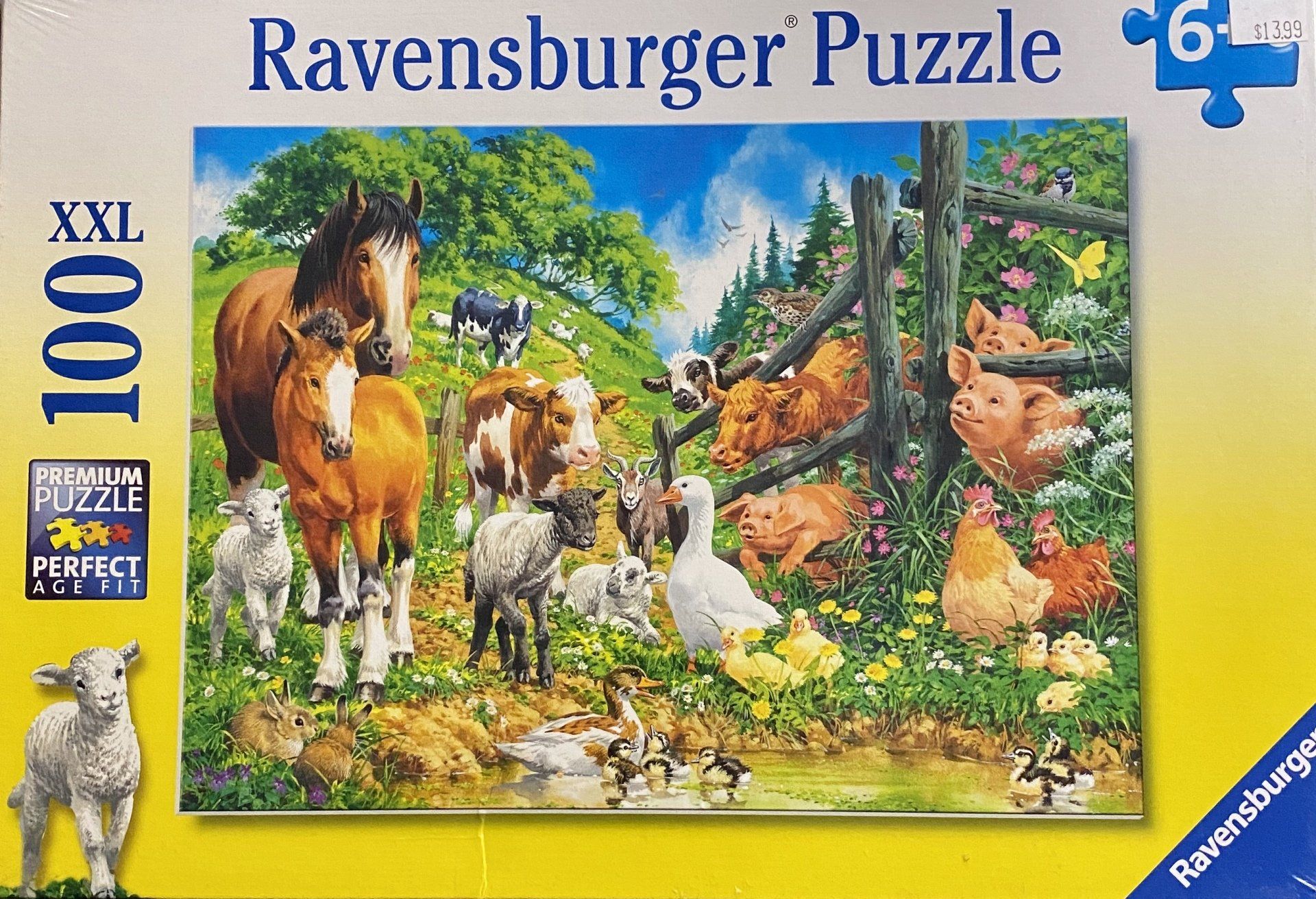 A Ravensburger 100-piece XXL puzzle box showing a colorful farm scene with horses, cows, pigs, sheep, and other animals.