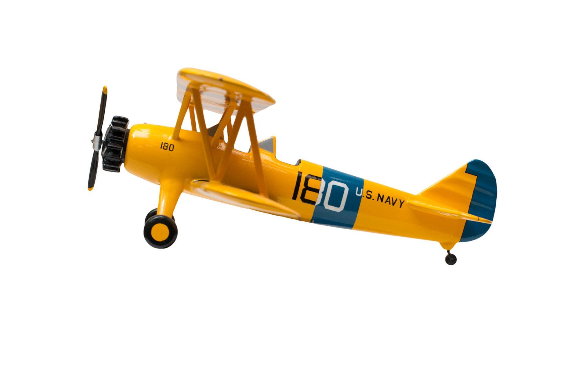 A yellow vintage biplane model with