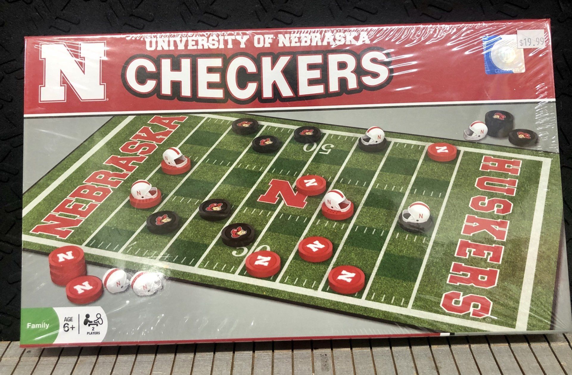 University of Nebraska Huskers themed checkers board game in a box, featuring a football field design.